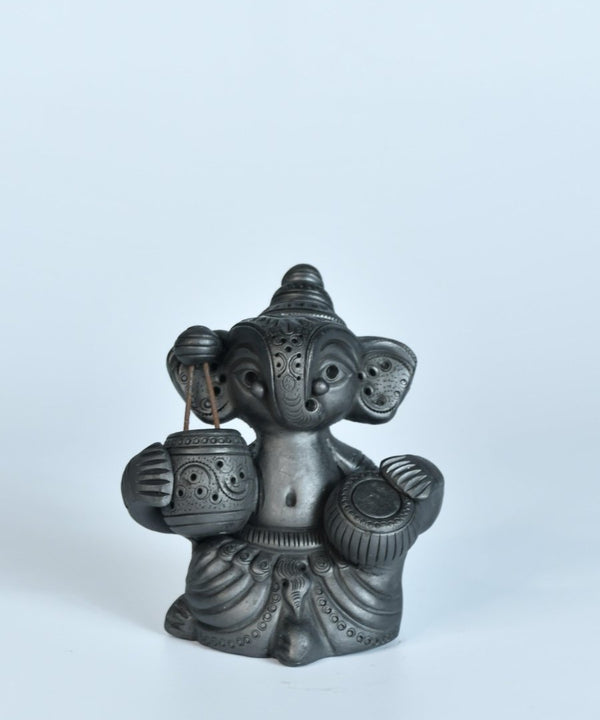 Serene Rhythms: Black Terracotta Ganesh Playing Iktara and Tabla — image 5