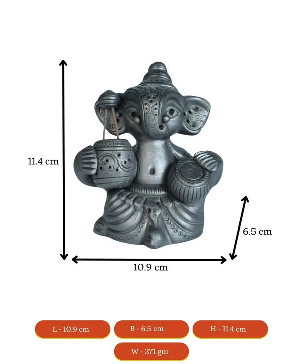 Serene Rhythms: Black Terracotta Ganesh Playing Iktara and Tabla — image 7