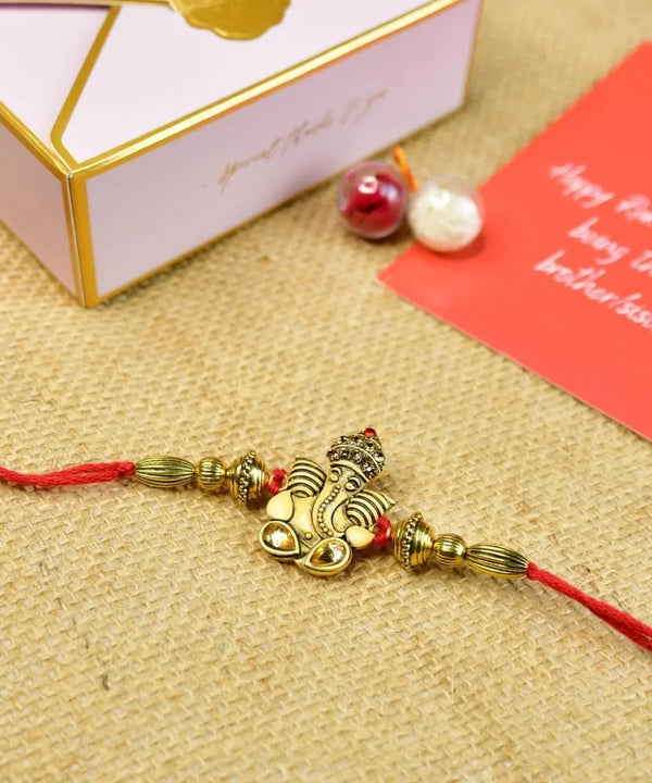 Sowpeace Exquisite Golden Ganesha Rakhi Pack of 1 with Roli Chawal and Greeting card combo for Raksha Bandhan and Gifting — image 10