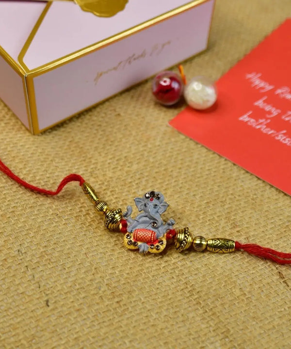 Sowpeace Exquisite Green Ganesha Rakhi Pack of 1 with Roli Chawal and Greeting card combo for Raksha Bandhan and Gifting — main view