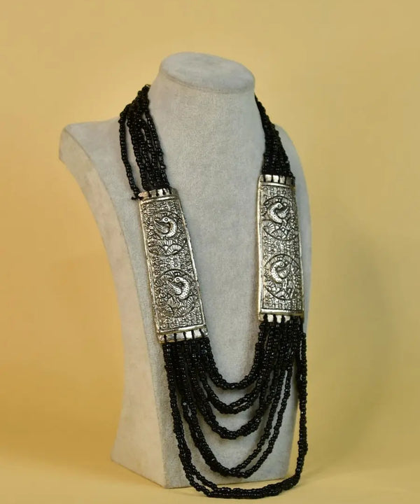 Sowpeace German Silver Necklace: Peacock Art on Metal with Black Beads — main view