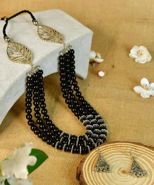 Sowpeace Handcrafted German Silver Necklace: Black Beads & Leaf Design — main view