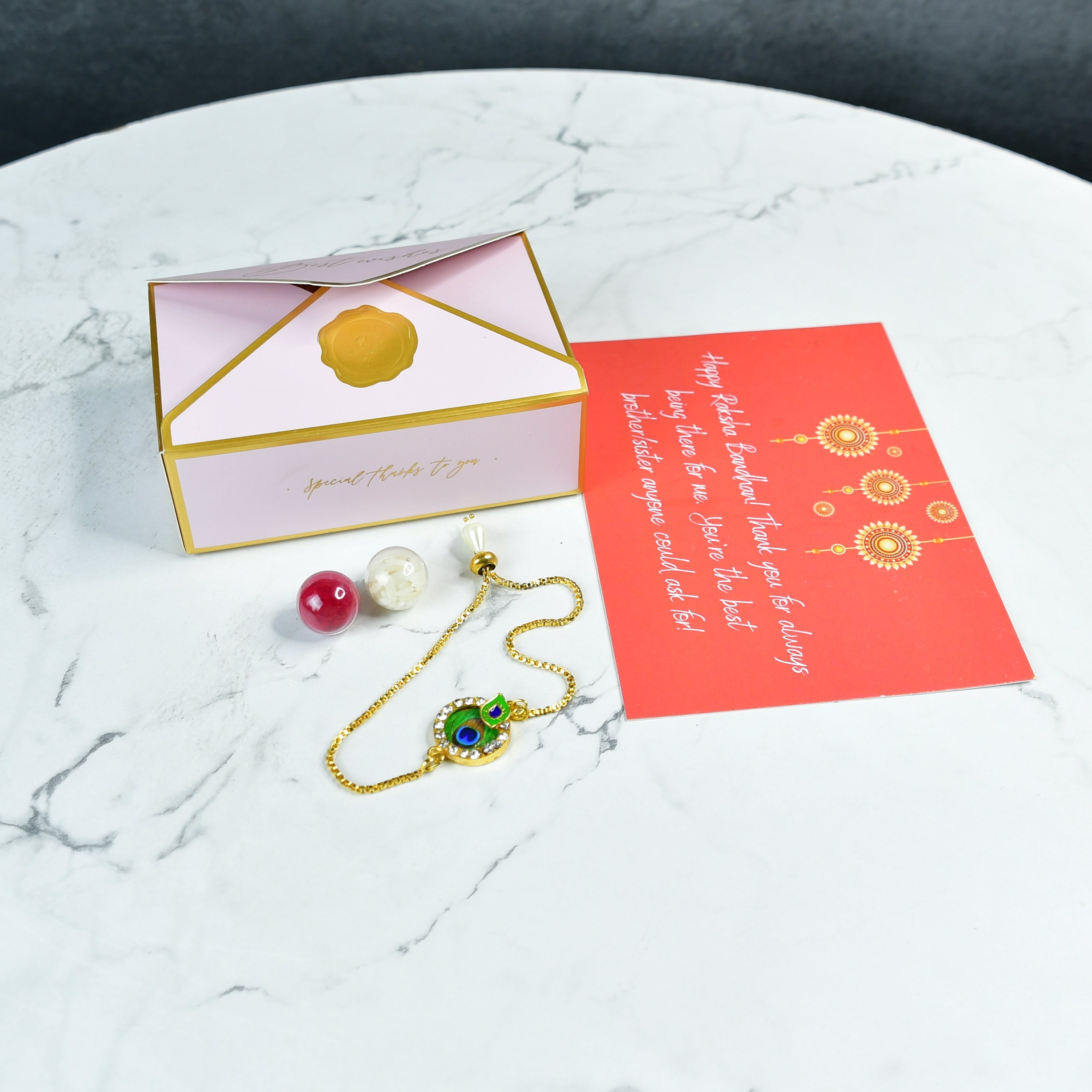 Sowpeace Exquisite Peacock Rakhi Pack of 1 with Roli Chawal and Greeting card combo for Raksha Bandhan and Gifting