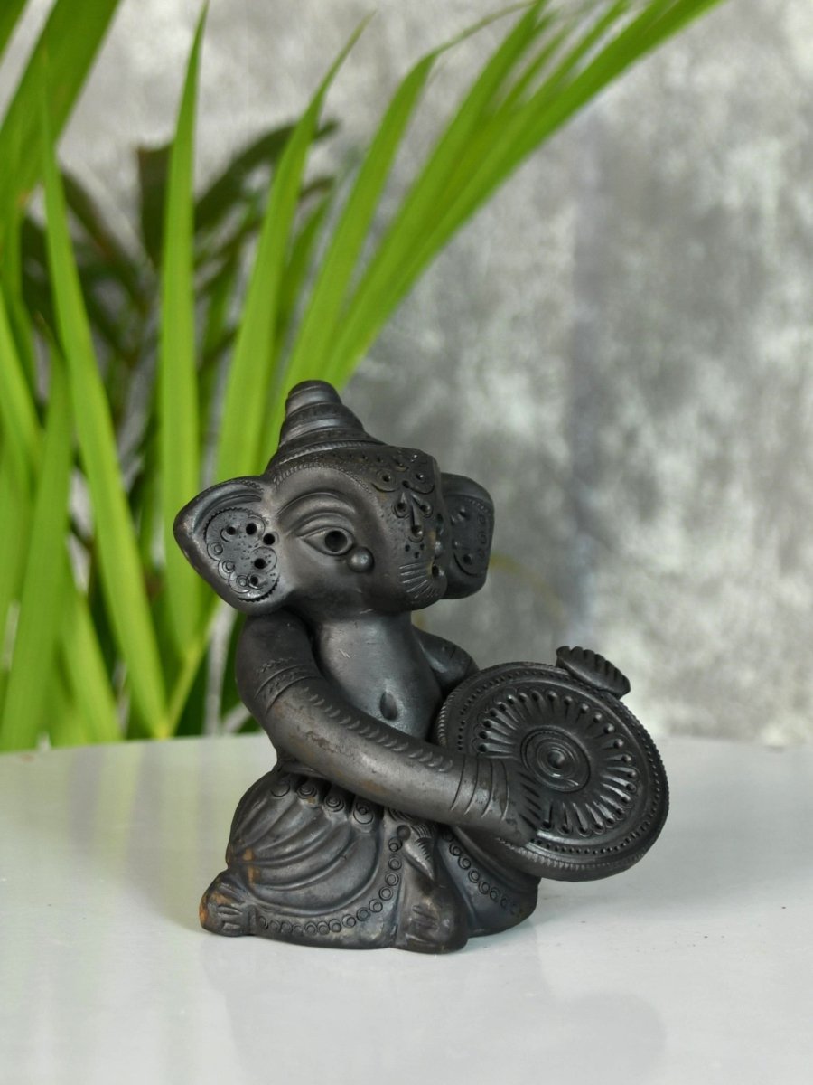 Black Terracotta Ganesh: Dafli Tabletop Decor - decor - Sowpeace - Black Terracotta Ganesh: Dafli Tabletop Decor - Terr - bter - TT - GDP - Sowpeace