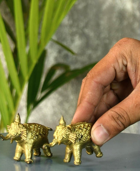 Handcrafted Brass Dhokra Elephant Tabletop Decor: Artisan Elegance for Home.