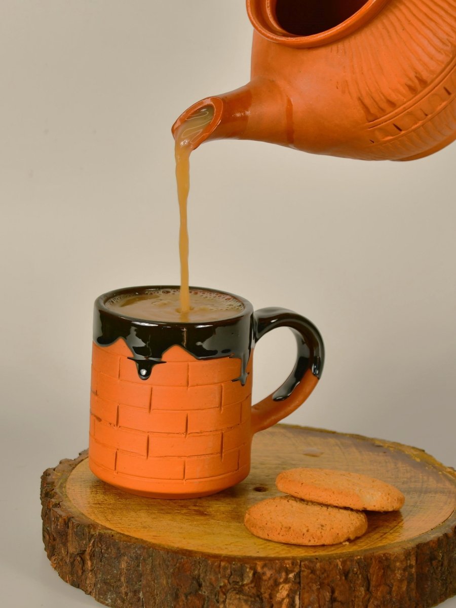 Sculpted Terracotta Coffee Mug: Stylish Functionality