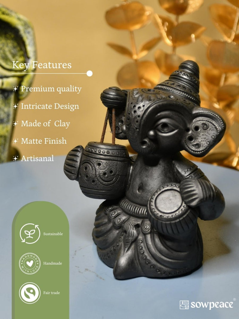 Serene Rhythms: Black Terracotta Ganesh Playing Iktara and Tabla – view 6