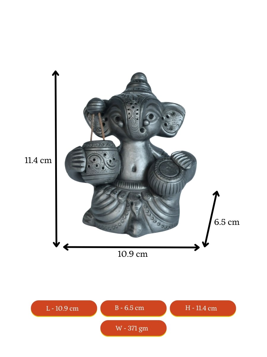 Serene Rhythms: Black Terracotta Ganesh Playing Iktara and Tabla