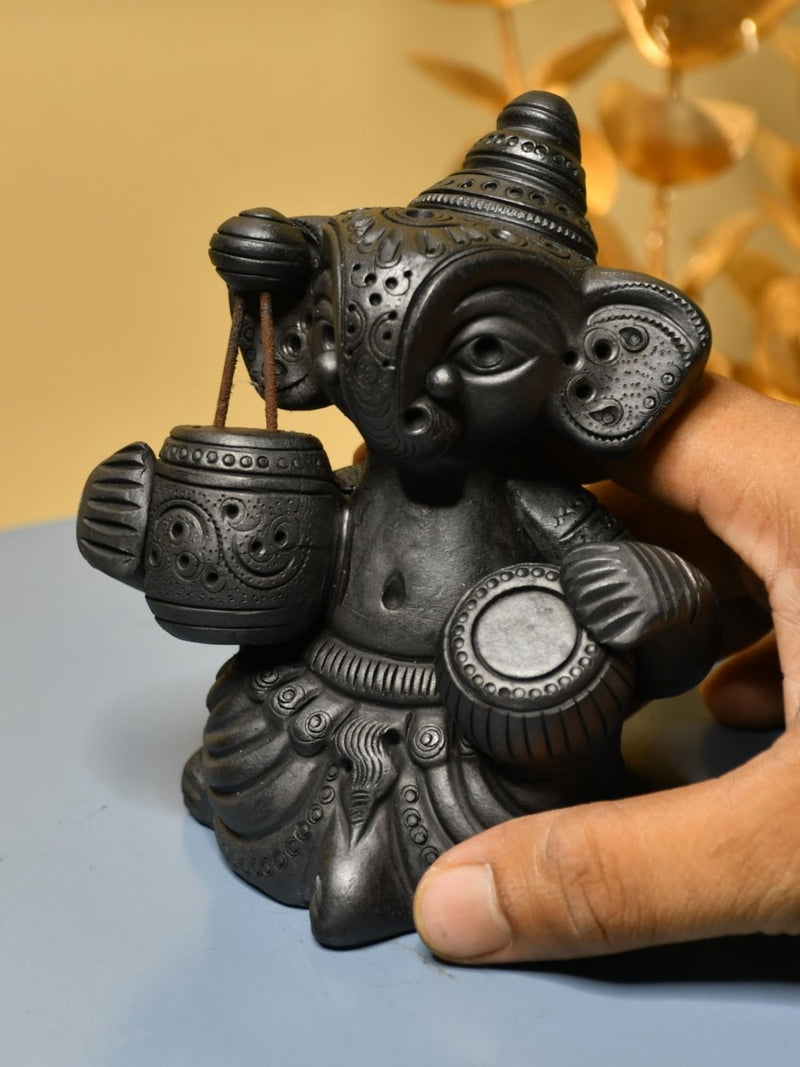 Serene Rhythms: Black Terracotta Ganesh Playing Iktara and Tabla – view 2