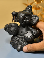 Serene Rhythms: Black Terracotta Ganesh Playing Iktara and Tabla - Additional View