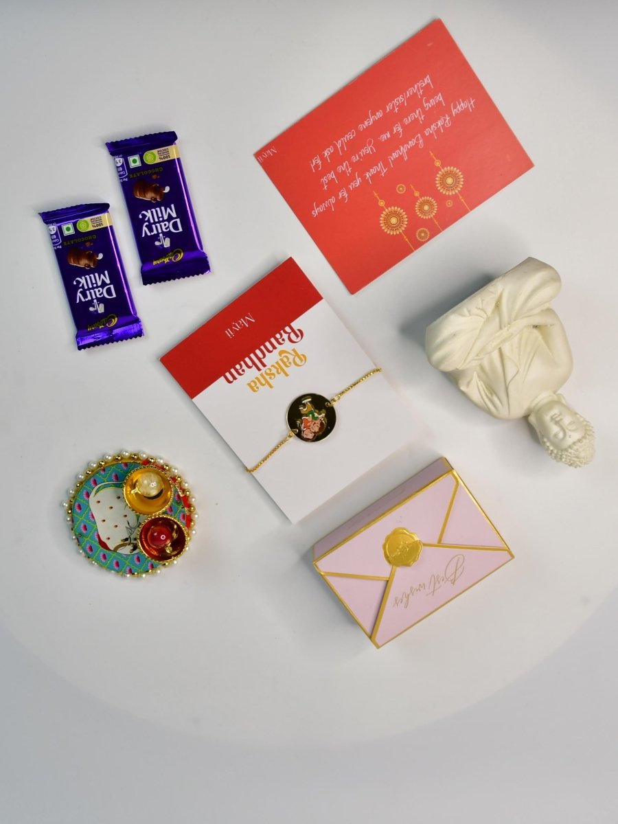 Sowpeace Exquisite Bhai Behen Rakhi Pack of 1 with Roli Chawal Thali, Chocolates, Buddha and Greeting card combo for Raksha Bandhan and Gifting