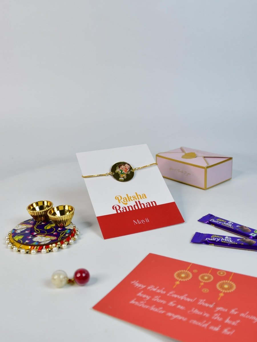 Sowpeace Exquisite Bhai Behen Rakhi Pack of 1 with Roli Chawal Thali, two Chocolates, and Greeting card combo for Raksha Bandhan and Gifting