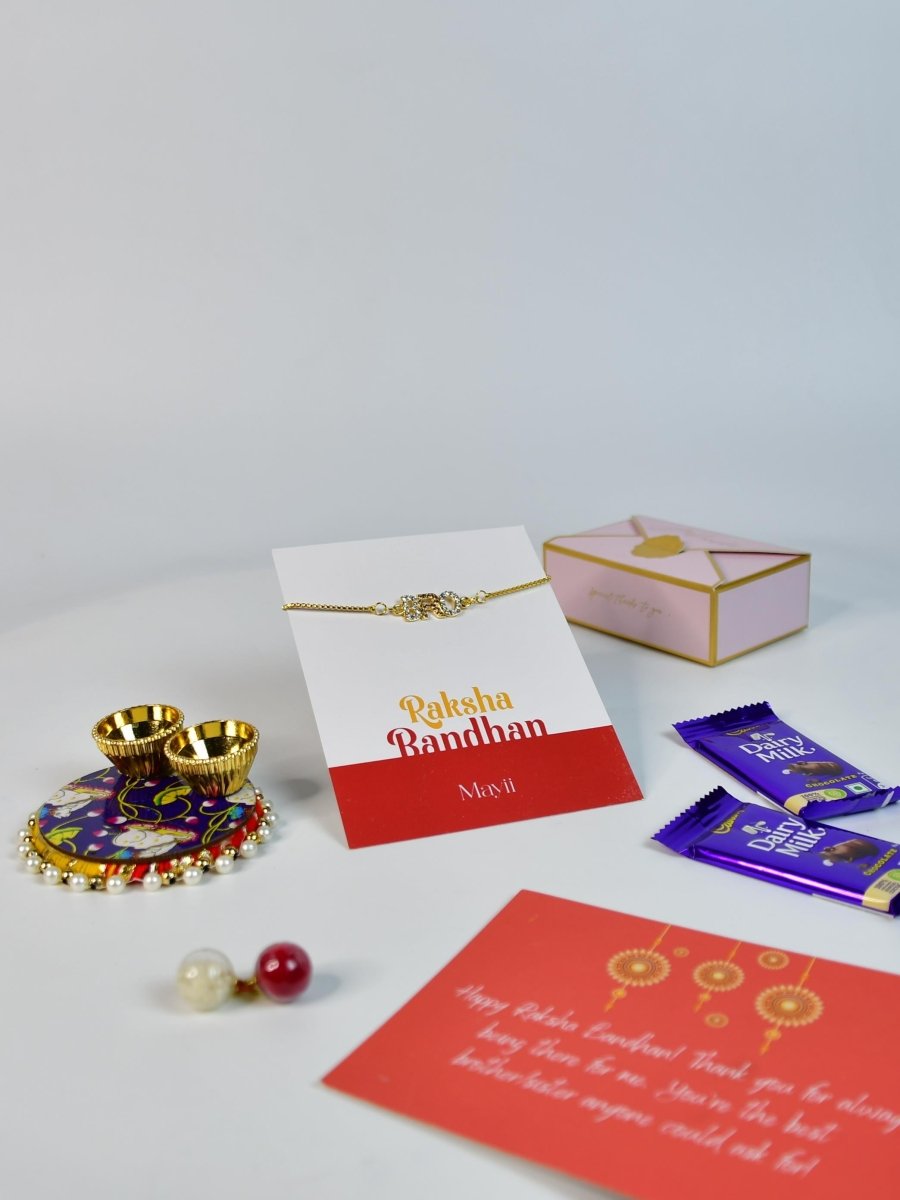 Sowpeace Exquisite BRO Rakhi Pack of 1 with Roli Chawal Thali, Chocolates, and Greeting card combo for Raksha Bandhan and Gifting