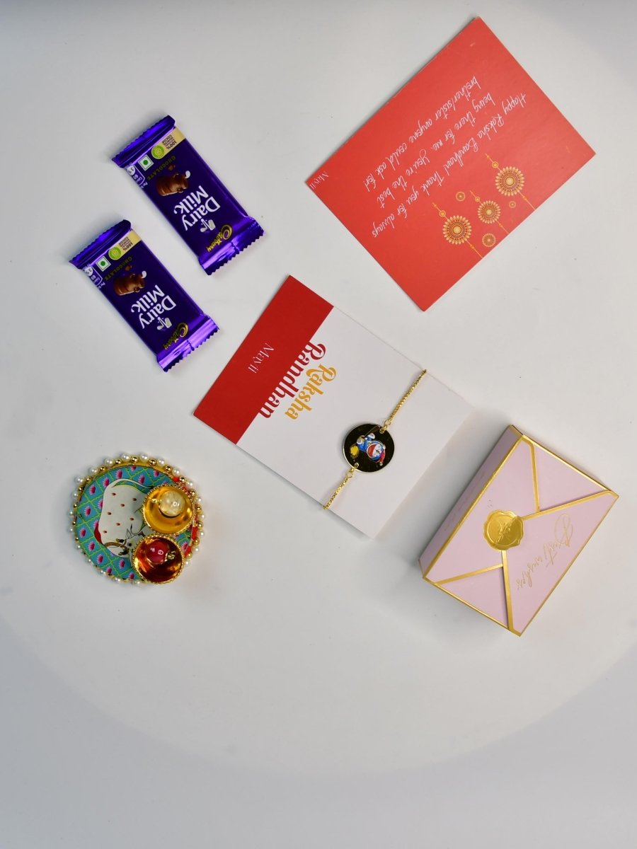 Sowpeace Exquisite Doraemon Rakhi Pack of 1 with Roli Chawal Thali, Chocolates, and Greeting card combo for Raksha Bandhan and Gifting