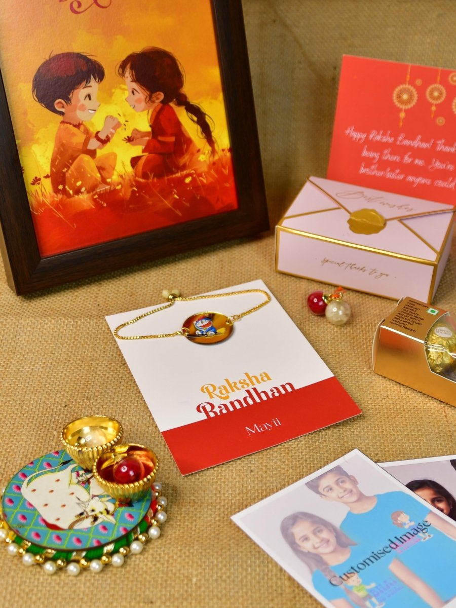 Sowpeace Exquisite Doraemon Rakhi Pack of 1 with Roli Chawal Thali, Chocolates, Photo Frame, Poloroids and Greeting card combo for Raksha Bandhan and Gifting