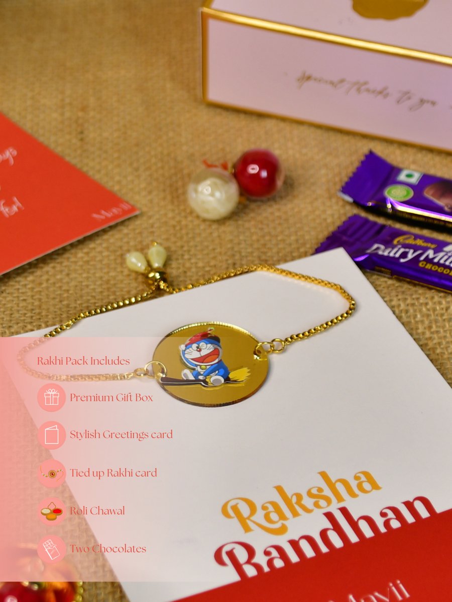 Sowpeace Exquisite Doraemon Rakhi Pack of 1 with Roli Chawal Thali, two Chocolates, and Greeting card combo for Raksha Bandhan and Gifting - Rakhi - Sowpeace - Sowpeace Exquisite Doraemon Rakhi Pack of 1 with Roli Chawal Thali, two Chocolates, and Greeting card combo for Raksha Bandhan and Gifting - RAK - DORA - HND - P2 - Sowpeace