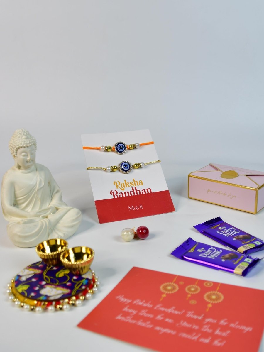 Sowpeace Exquisite Evil Eye Rakhi Pack of 1 with Roli Chawal Thali, Chocolates, Buddha and Greeting card combo for Raksha Bandhan and Gifting - Rakhi - Sowpeace - Default Title - RAK - EVI - HND - P4 - Sowpeace