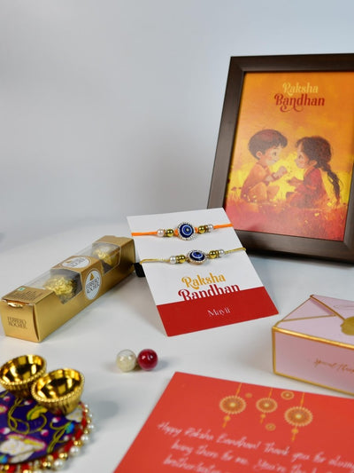 Sowpeace Exquisite Evil Eye Rakhi Pack of 1 with Roli Chawal Thali, Chocolates, Photo Frame and Greeting card combo for Raksha Bandhan and Gifting