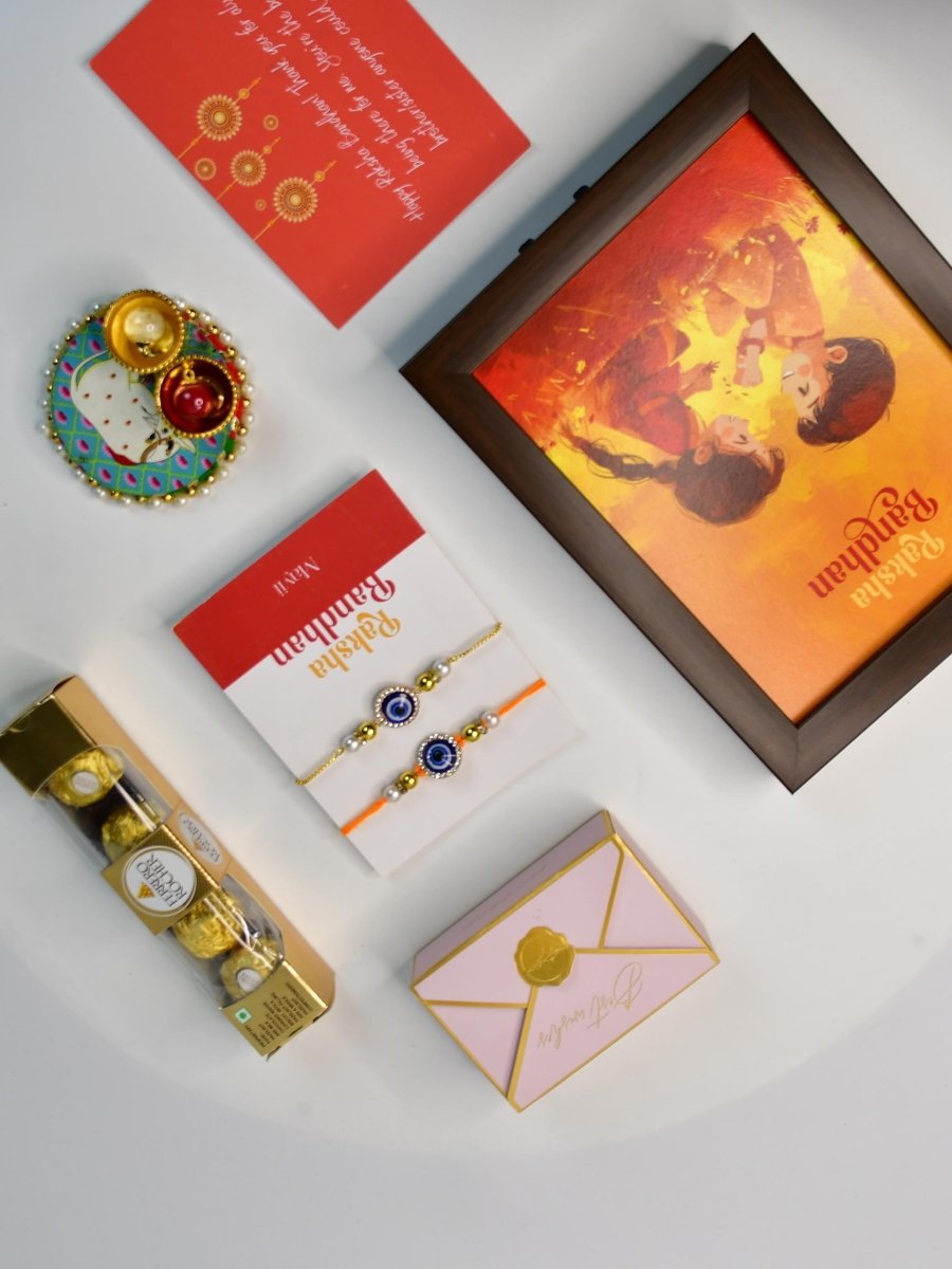 Sowpeace Exquisite Evil Eye Rakhi Pack of 1 with Roli Chawal Thali, Chocolates, Photo Frame and Greeting card combo for Raksha Bandhan and Gifting