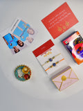 Sowpeace Exquisite Evil Eye Rakhi Pack of 1 with Roli Chawal Thali, Chocolates, Poloroids and Greeting card combo for Raksha Bandhan and Gifting - Rakhi - Sowpeace - Sowpeace Exquisite Evil Eye Rakhi Pack of 1 with Roli Chawal Thali, Chocolates, Poloroids and Greeting card combo for Raksha Bandhan and Gifting - RAK - EVI - HND - P5 - Sowpeace