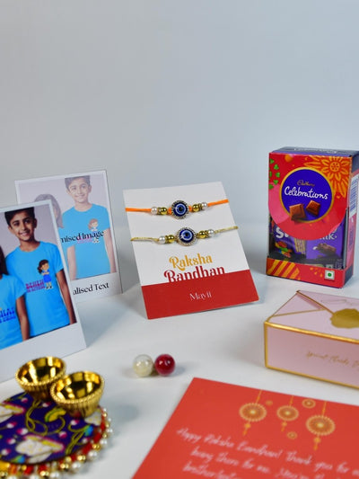 Sowpeace Exquisite Evil Eye Rakhi Pack of 1 with Roli Chawal Thali, Chocolates, Poloroids and Greeting card combo for Raksha Bandhan and Gifting