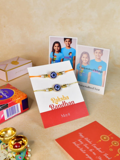 Sowpeace Exquisite Evil Eye Rakhi Pack of 1 with Roli Chawal Thali, Chocolates, Poloroids and Greeting card combo for Raksha Bandhan and Gifting