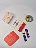 Sowpeace Exquisite Evil Eye Rakhi Pack of 1 with Roli Chawal Thali, two Chocolates, and Greeting card combo for Raksha Bandhan and Gifting - Rakhi - Sowpeace - Sowpeace Exquisite Evil Eye Rakhi Pack of 1 with Roli Chawal Thali, two Chocolates, and Greeting card combo for Raksha Bandhan and Gifting - RAK - EVI - HND - P2 - Sowpeace