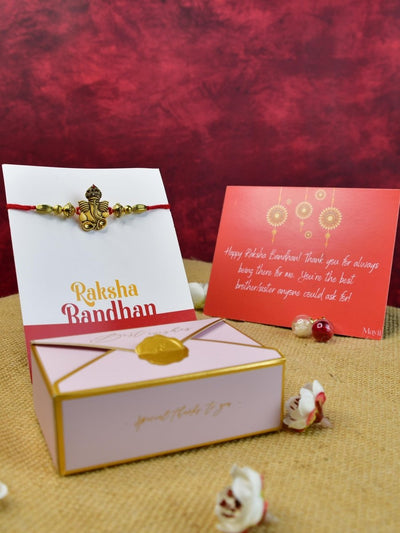 Sowpeace Exquisite Golden Ganesha Rakhi Pack of 1 with Roli Chawal and Greeting card combo for Raksha Bandhan and Gifting