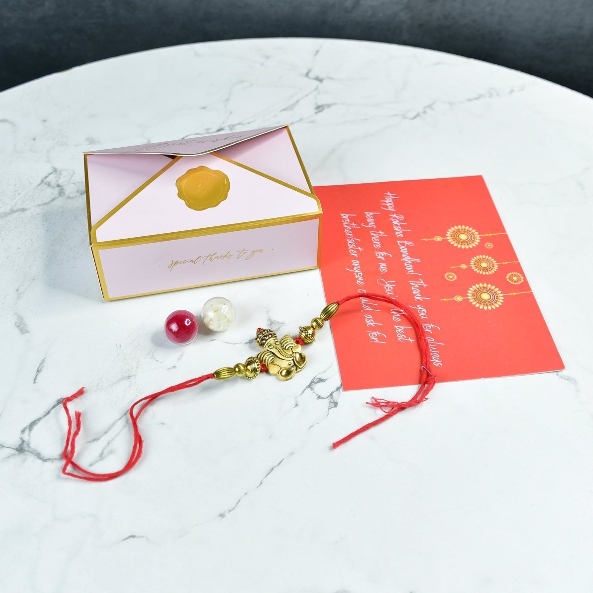 Sowpeace Exquisite Golden Ganesha Rakhi Pack of 1 with Roli Chawal and Greeting card combo for Raksha Bandhan and Gifting - Sowpeace - 