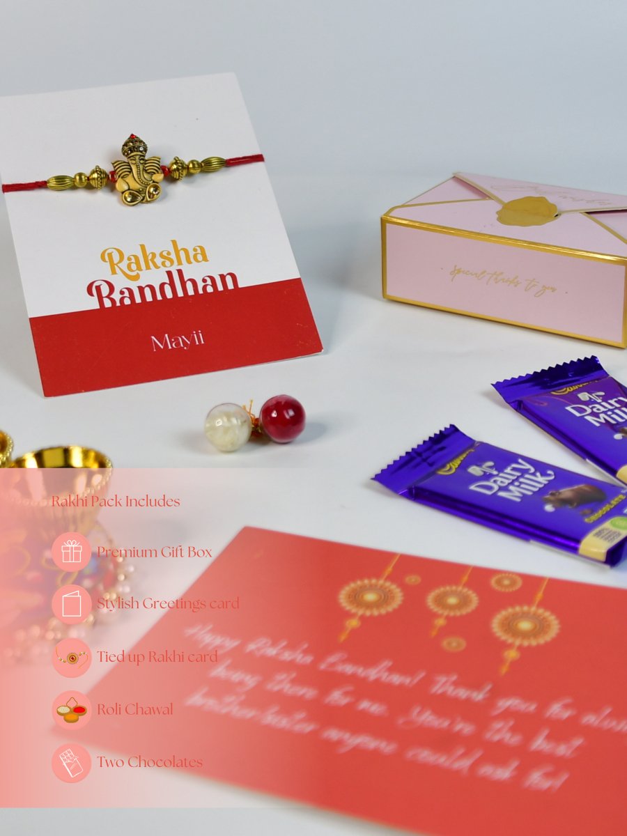 Sowpeace Exquisite Golden Ganesha Rakhi Pack of 1 with Roli Chawal Thali, Chocolates, and Greeting card combo for Raksha Bandhan and Gifting - Rakhi - Sowpeace - Sowpeace Exquisite Golden Ganesha Rakhi Pack of 1 with Roli Chawal Thali, Chocolates, and Greeting card combo for Raksha Bandhan and Gifting - RAK - GNS - HND - P3 - Sowpeace