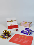 Sowpeace Exquisite Golden Ganesha Rakhi Pack of 1 with Roli Chawal Thali, Chocolates, and Greeting card combo for Raksha Bandhan and Gifting - Rakhi - Sowpeace - Sowpeace Exquisite Golden Ganesha Rakhi Pack of 1 with Roli Chawal Thali, Chocolates, and Greeting card combo for Raksha Bandhan and Gifting - RAK - GNS - HND - P3 - Sowpeace