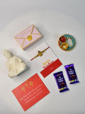 Sowpeace Exquisite Golden Ganesha Rakhi Pack of 1 with Roli Chawal Thali, Chocolates, Buddha and Greeting card combo for Raksha Bandhan and Gifting - Rakhi - Sowpeace - Sowpeace Exquisite Golden Ganesha Rakhi Pack of 1 with Roli Chawal Thali, Chocolates, Buddha and Greeting card combo for Raksha Bandhan and Gifting - RAK - GNS - HND - P4 - Sowpeace