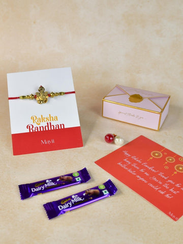 Sowpeace Exquisite Golden Ganesha Rakhi Pack of 1 with Roli Chawal Thali, two Chocolates, and Greeting card combo for Raksha Bandhan and Gifting - Rakhi - Sowpeace - Default Title - RAK - GNS - HND - P2 - Sowpeace