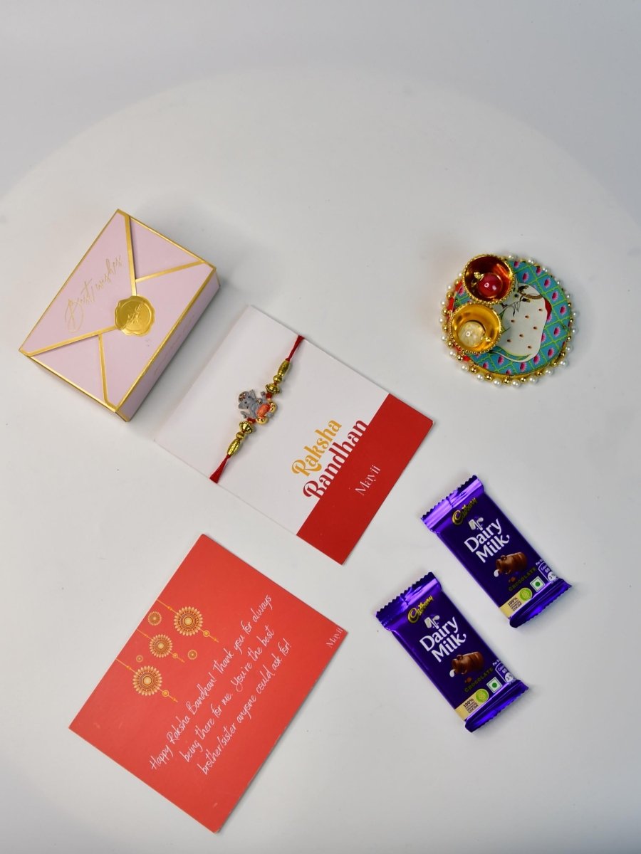 Sowpeace Exquisite Green Ganesha Rakhi Pack of 1 with Roli Chawal Thali, Chocolates, and Greeting card combo for Raksha Bandhan and Gifting