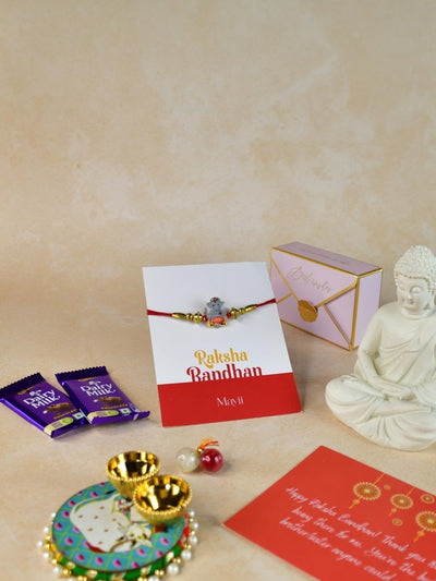 Sowpeace Exquisite Green Ganesha Rakhi Pack of 1 with Roli Chawal Thali, Chocolates, Buddha and Greeting card combo for Raksha Bandhan and Gifting