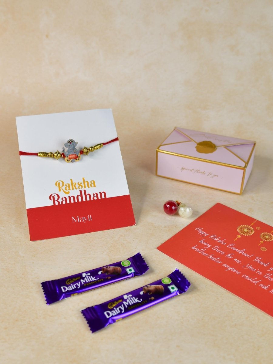 Sowpeace Exquisite Green Ganesha Rakhi Pack of 1 with Roli Chawal Thali, two Chocolates, and Greeting card combo for Raksha Bandhan and Gifting - Rakhi - Sowpeace - Default Title - RAK - GNS - HND - PG2 - Sowpeace