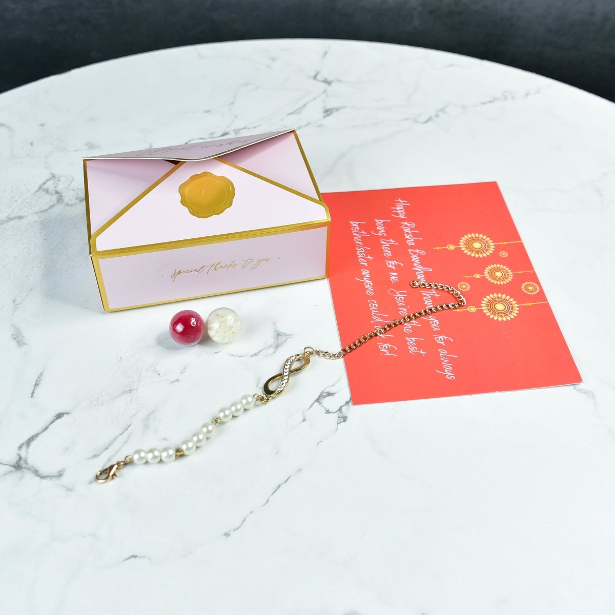 Sowpeace Exquisite Infinite Rakhi Pack of 1 with Roli Chawal and Greeting card combo for Raksha Bandhan and Gifting - Sowpeace - 