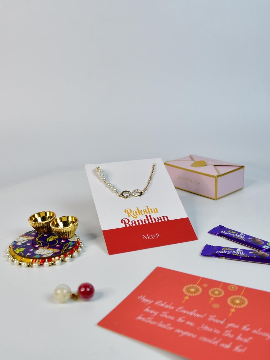 Sowpeace Exquisite Infinite Rakhi Pack of 1 with Roli Chawal Thali, Chocolates, and Greeting card combo for Raksha Bandhan and Gifting - Rakhi - Sowpeace - Default Title - RAK - INF - HND - P2 - Sowpeace