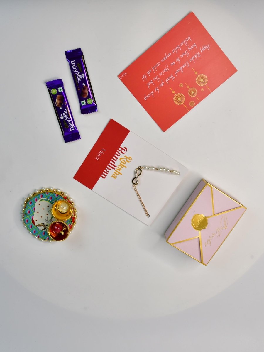 Sowpeace Exquisite Infinite Rakhi Pack of 1 with Roli Chawal Thali, two Chocolates, and Greeting card combo for Raksha Bandhan and Gifting