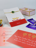 Sowpeace Exquisite Peacock Rakhi Pack of 1 with Roli Chawal Thali, Chocolates, and Greeting card combo for Raksha Bandhan and Gifting - Rakhi - Sowpeace - Sowpeace Exquisite Peacock Rakhi Pack of 1 with Roli Chawal Thali, Chocolates, and Greeting card combo for Raksha Bandhan and Gifting - RAK - CIRPK - HND - P3 - Sowpeace