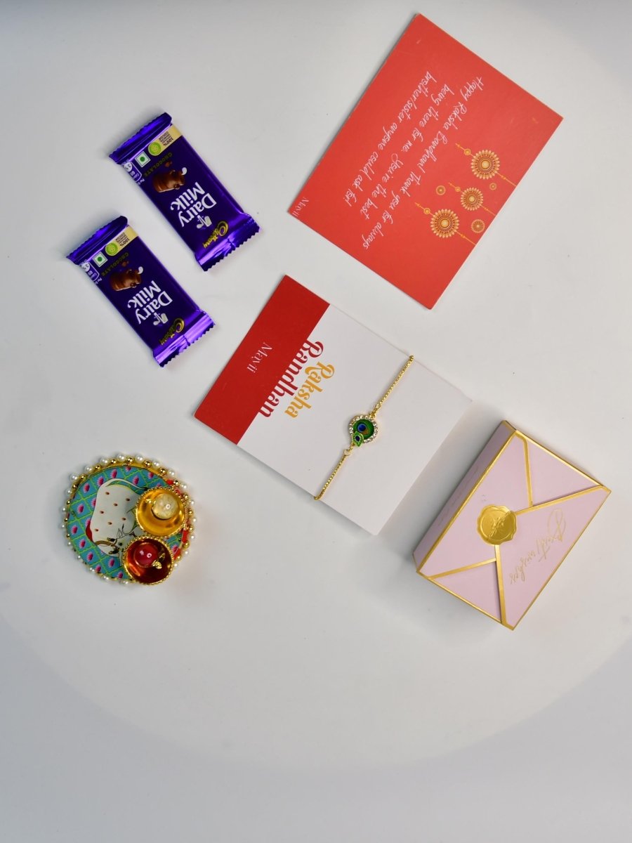 Sowpeace Exquisite Peacock Rakhi Pack of 1 with Roli Chawal Thali, Chocolates, and Greeting card combo for Raksha Bandhan and Gifting