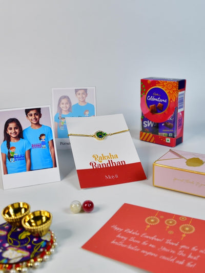 Sowpeace Exquisite Peacock Rakhi Pack of 1 with Roli Chawal Thali, Chocolates, Poloroids and Greeting card combo for Raksha Bandhan and Gifting