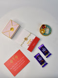 Sowpeace Exquisite Pearl Rakhi Pack of 1 with Roli Chawal Thali, Chocolates, and Greeting card combo for Raksha Bandhan and Gifting - Rakhi - Sowpeace - Sowpeace Exquisite Pearl Rakhi Pack of 1 with Roli Chawal Thali, Chocolates, and Greeting card combo for Raksha Bandhan and Gifting - RAK - PRL - HND - P3 - Sowpeace