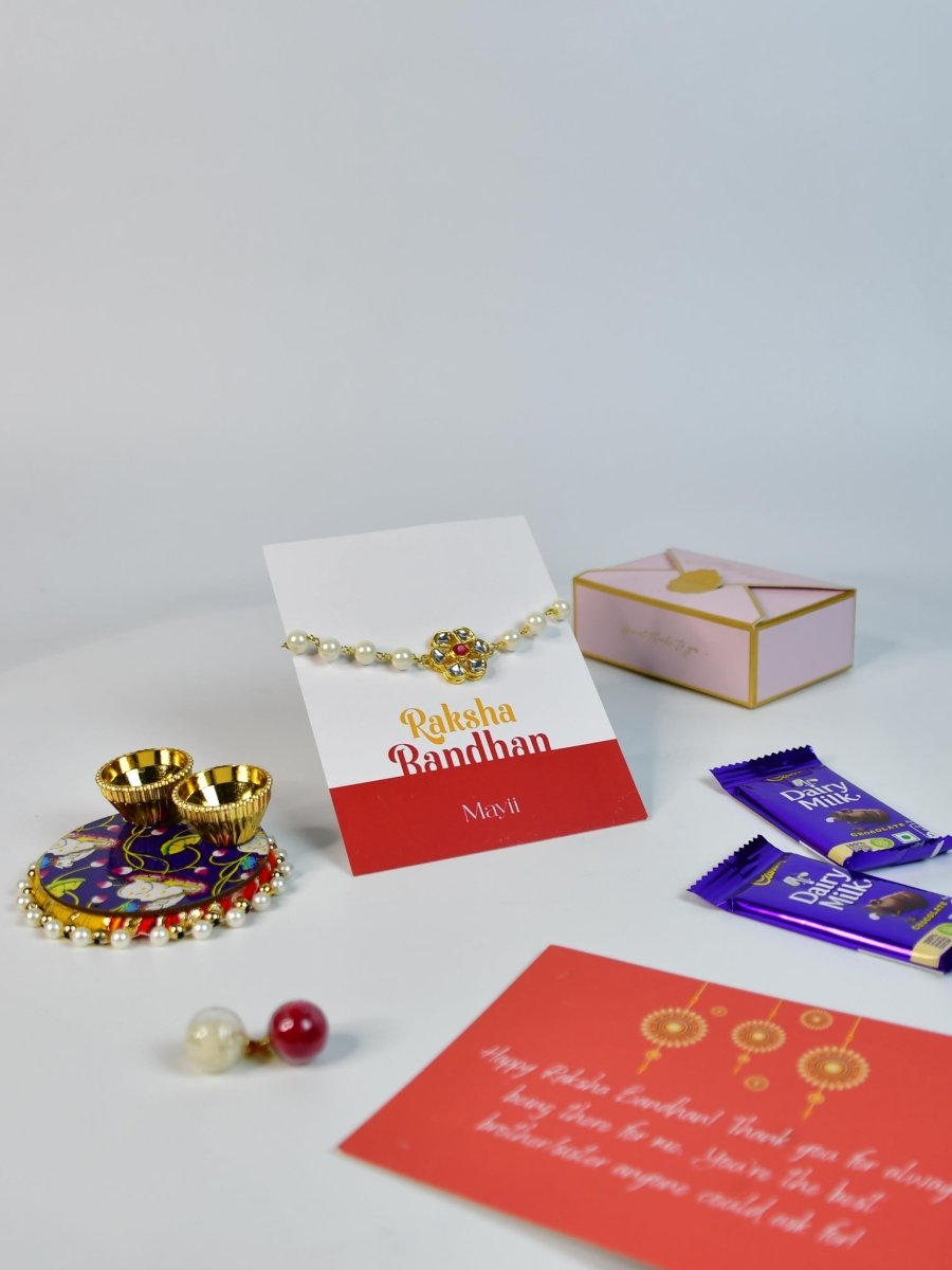 Sowpeace Exquisite Pearl Rakhi Pack of 1 with Roli Chawal Thali, Chocolates, and Greeting card combo for Raksha Bandhan and Gifting - Rakhi - Sowpeace - Default Title - RAK - PRL - HND - P3 - Sowpeace