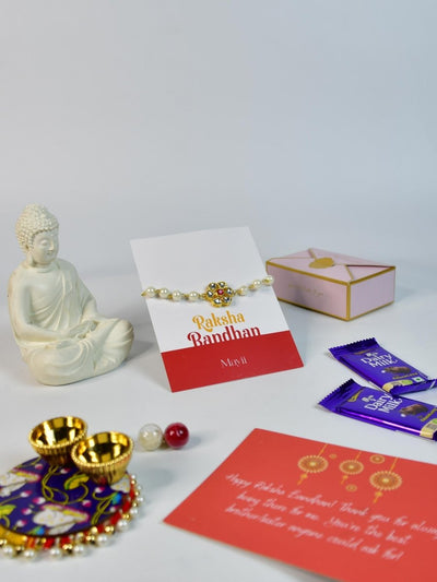 Sowpeace Exquisite Pearl Rakhi Pack of 1 with Roli Chawal Thali, Chocolates, Buddha and Greeting card combo for Raksha Bandhan and Gifting