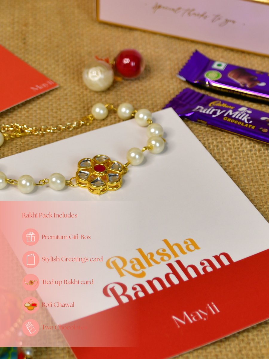 Sowpeace Exquisite Pearl Rakhi Pack of 1 with Roli Chawal Thali, two Chocolates, and Greeting card combo for Raksha Bandhan and Gifting - Rakhi - Sowpeace - Sowpeace Exquisite Pearl Rakhi Pack of 1 with Roli Chawal Thali, two Chocolates, and Greeting card combo for Raksha Bandhan and Gifting - RAK - PRL - HND - P2 - Sowpeace