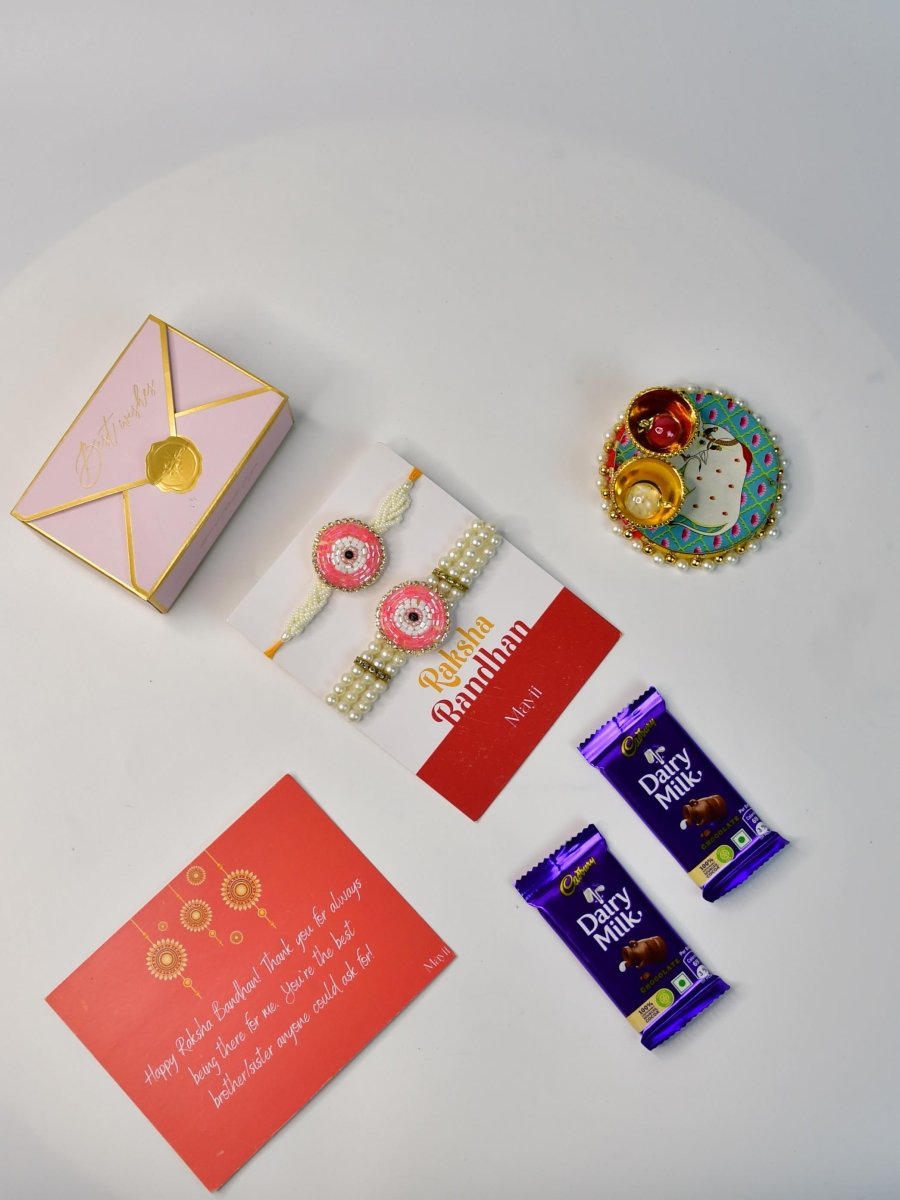 Sowpeace Exquisite Pink Circle Rakhi Pack of 1 with Roli Chawal Thali, Chocolates, and Greeting card combo for Raksha Bandhan and Gifting