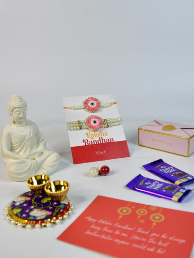 Sowpeace Exquisite Pink Circle Rakhi Pack of 1 with Roli Chawal Thali, Chocolates, Buddha and Greeting card combo for Raksha Bandhan and Gifting