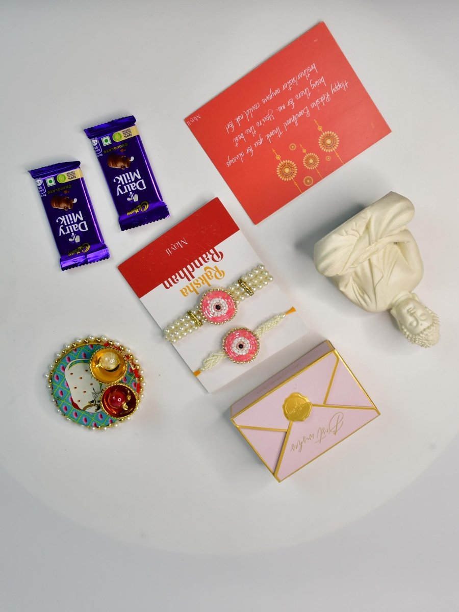 Sowpeace Exquisite Pink Circle Rakhi Pack of 1 with Roli Chawal Thali, Chocolates, Buddha and Greeting card combo for Raksha Bandhan and Gifting