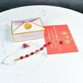 Sowpeace Exquisite Red Beads Rakhi Pack of 1 with Roli Chawal and Greeting card combo for Raksha Bandhan and Gifting - Sowpeace - 